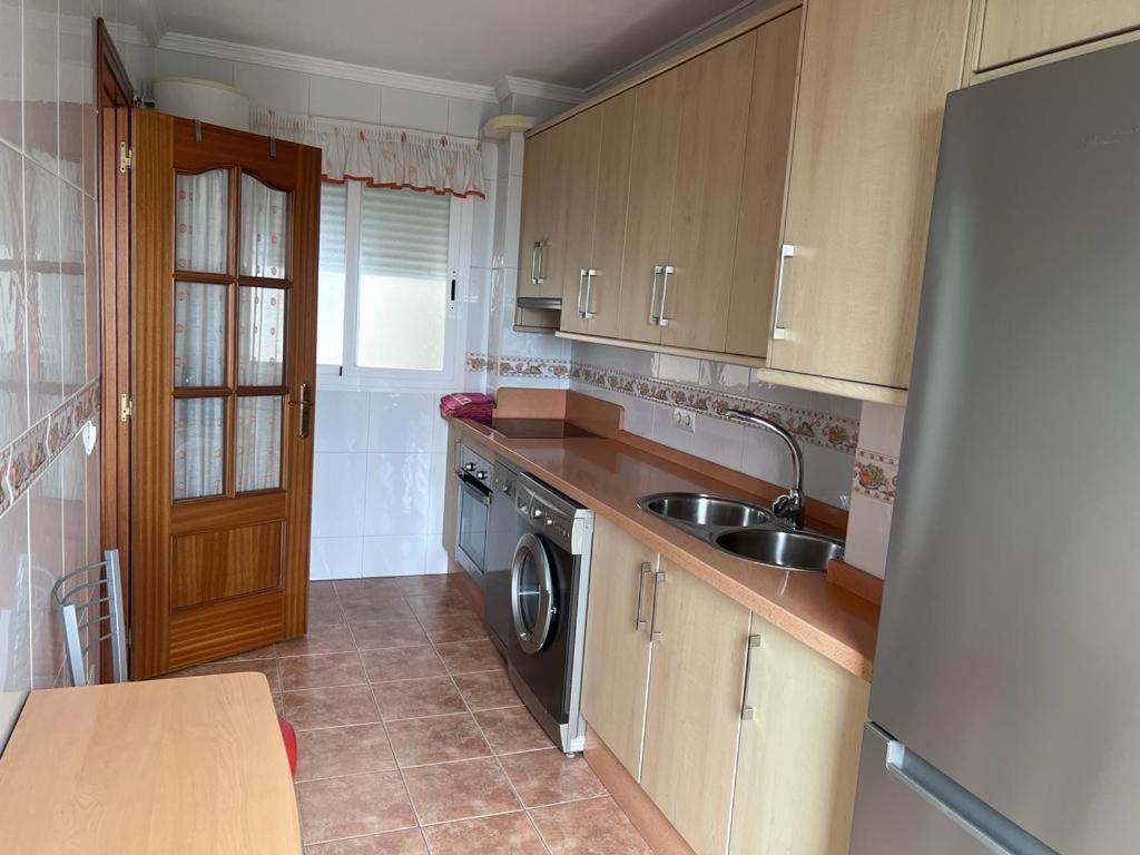 Apartamentos La Caleta 卡莱塔·德·贝莱斯 外观 照片