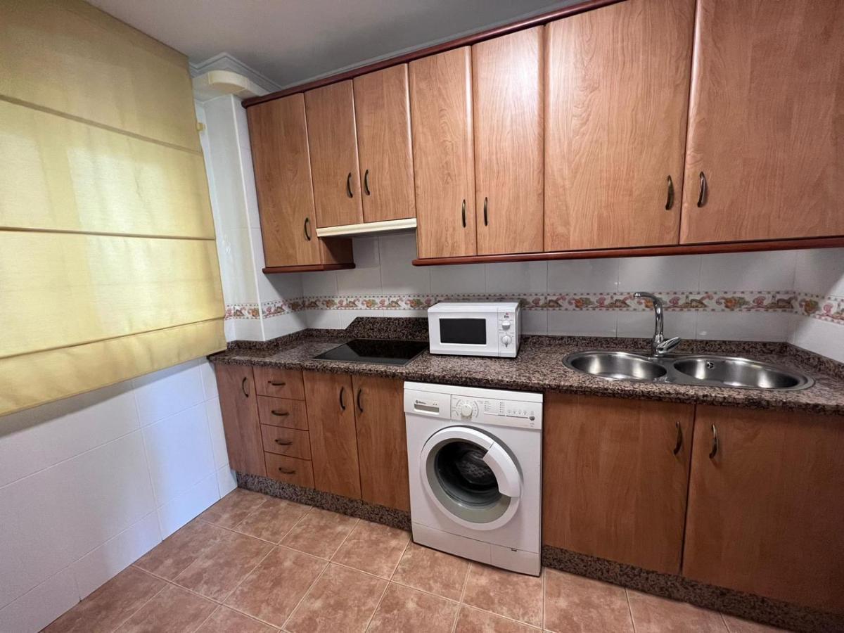 Apartamentos La Caleta 卡莱塔·德·贝莱斯 外观 照片