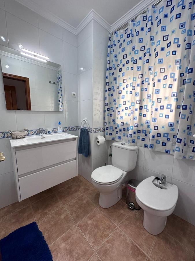 Apartamentos La Caleta 卡莱塔·德·贝莱斯 外观 照片